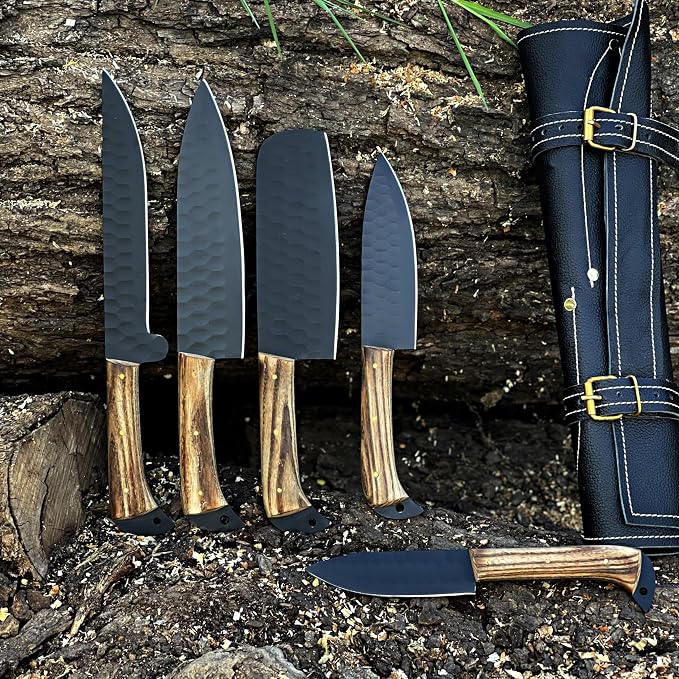 5 knives with black hammered blades and textured handles by log