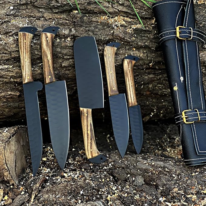 5 knives with black blades and leather case on bark background