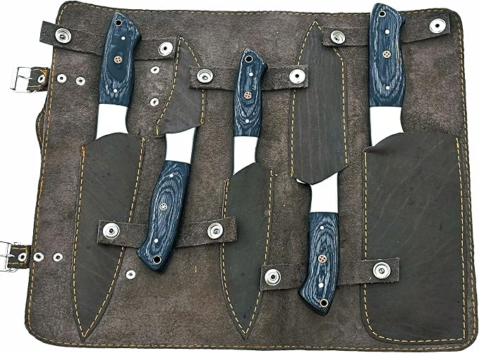 5 piece Damascus knife set placed in open leather case with sheaths