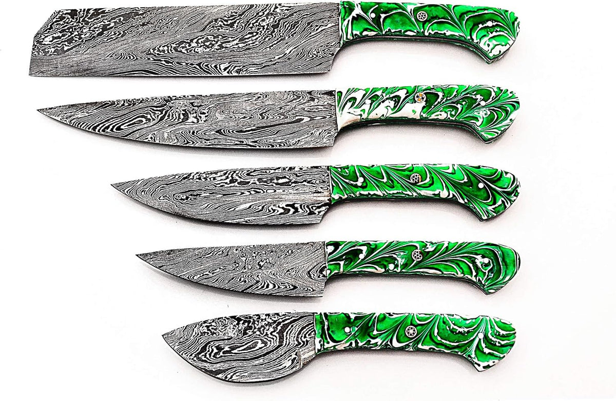 Damascus cleaver, chef and paring blades with green resin handles on white