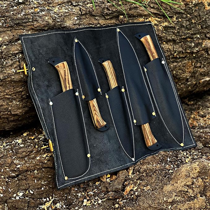 Open leather case with knives in individual sheaths on log