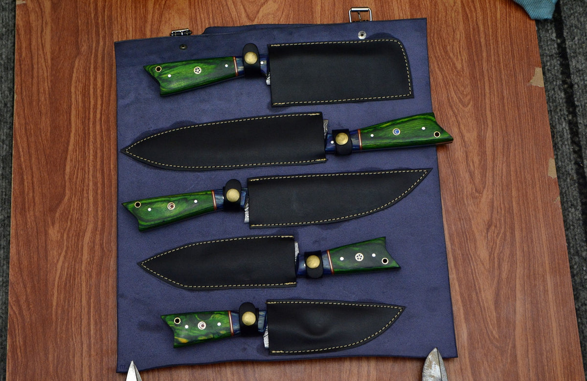 5 piece culinary knife set with Damascus blades and green pakka wood handles covered in sheaths