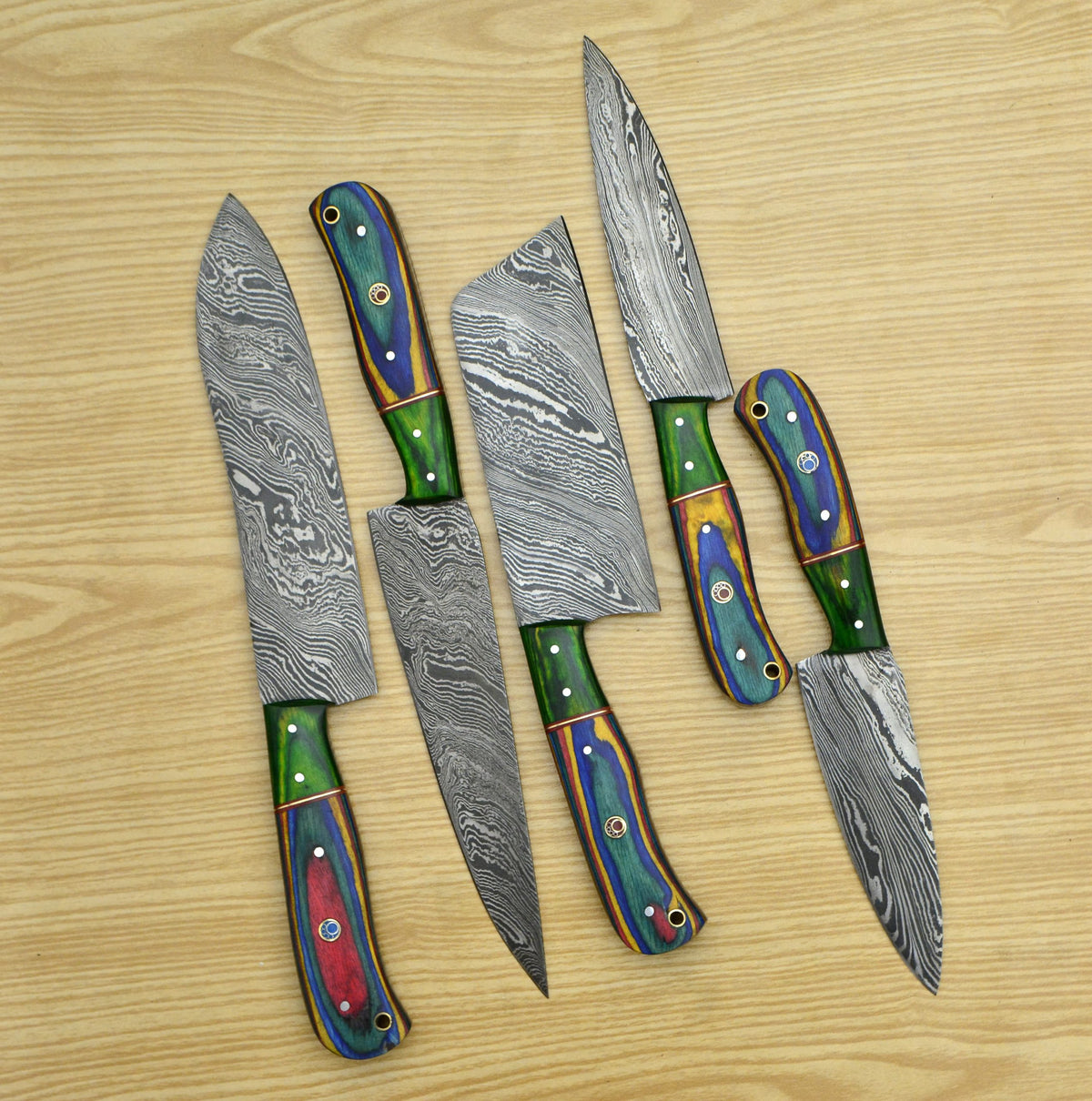piece Damascus steel chef knife set showing multicolor pakka wood handles