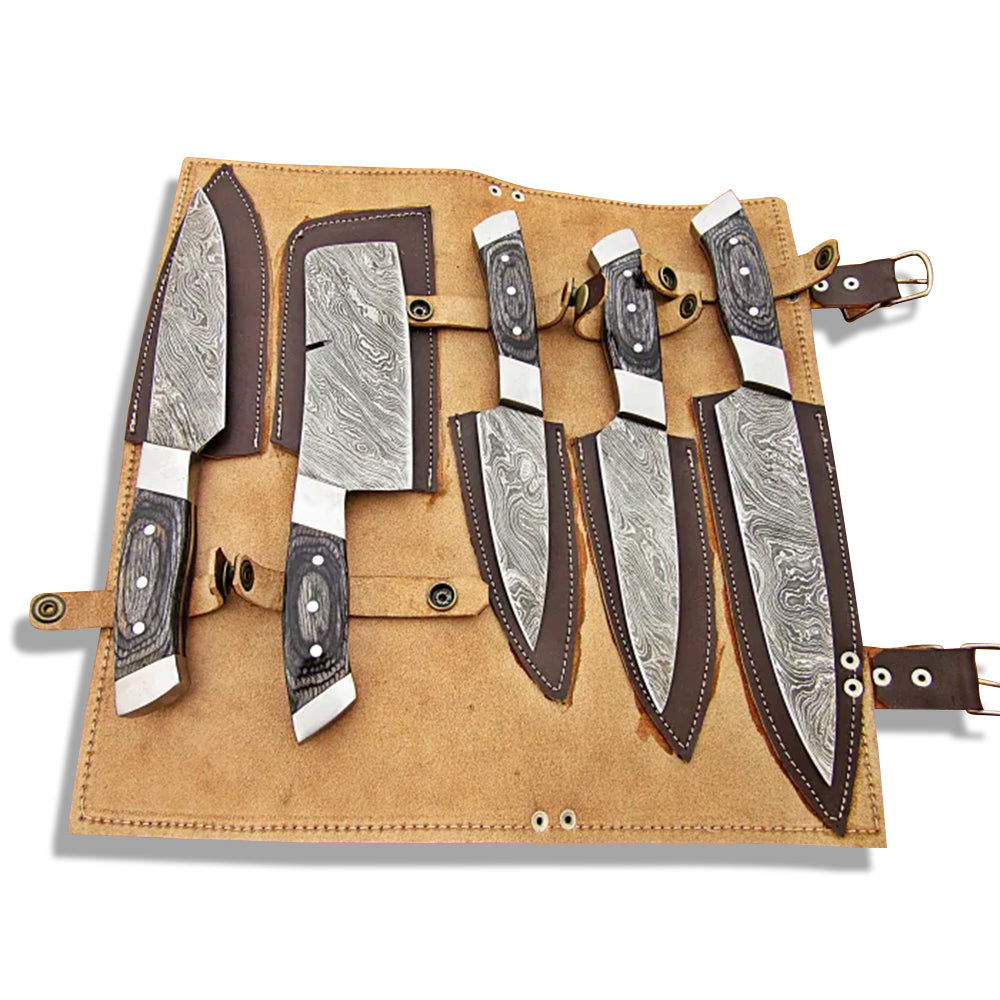5 piece Damascus steel kitchen knife set with black wood handles displayed inside a leather roll bag
