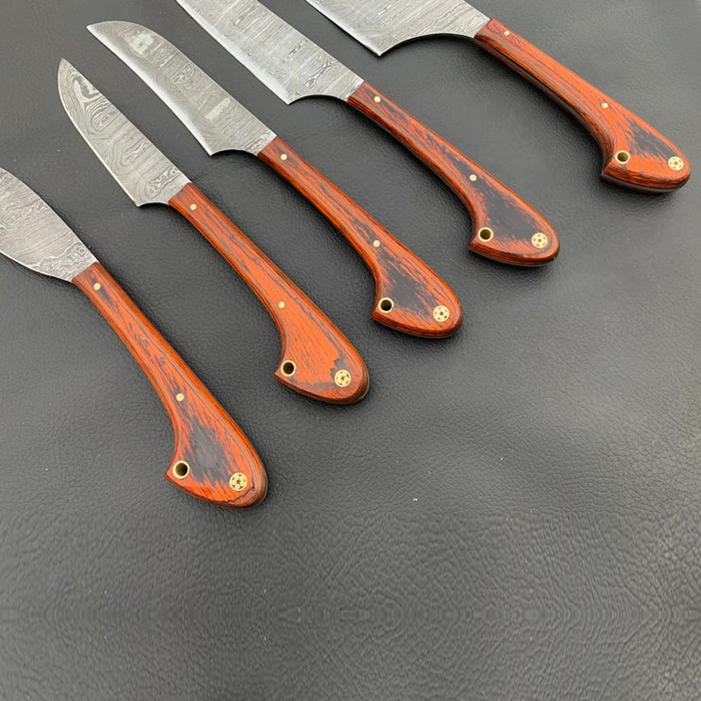 Close up view of custom Damascus steel knife pakka wood handles and pins