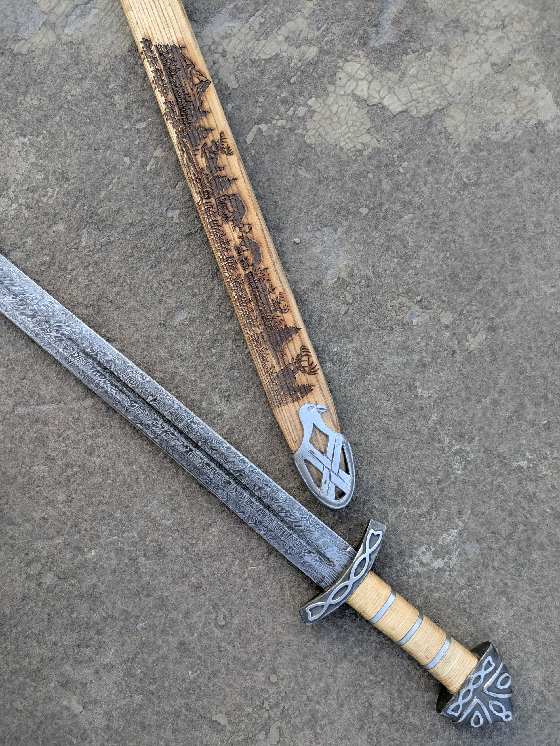 Damascus Steel Northman Viking Sword with carved wooden scabbard featuring forest scene