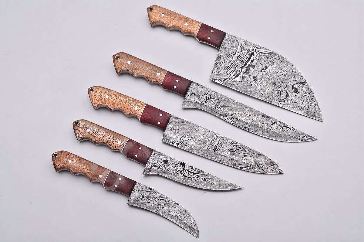5 piece Damascus knife set with wood handles fanned on white background