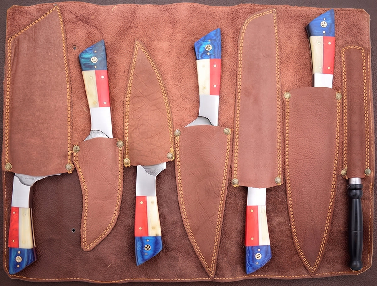 Leather roll case open showing all 5 Damascus knives and the sharpening rod in their slots