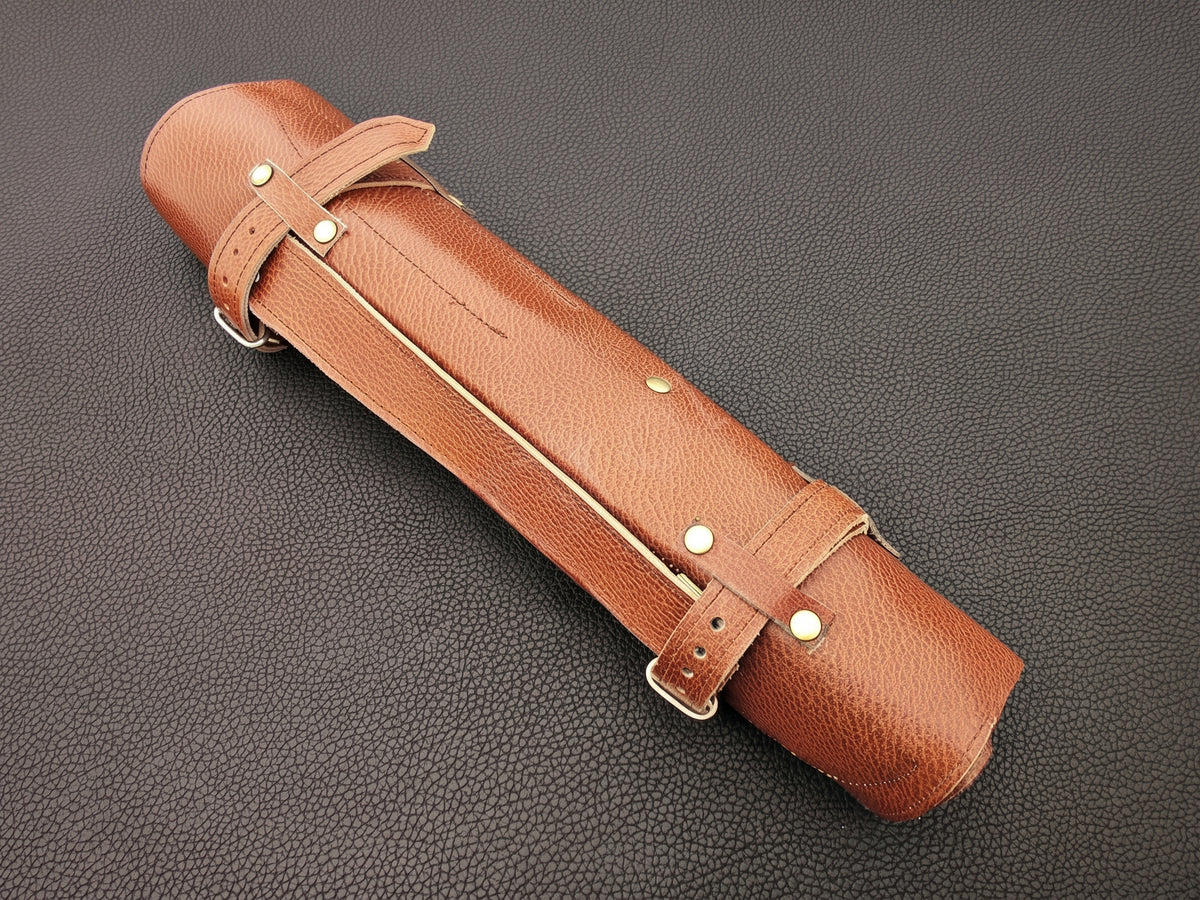 Brown leather knife case with wrist strap