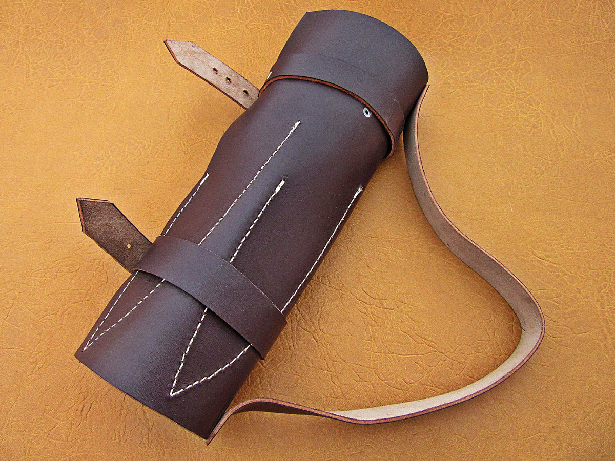 Rolled brown leather storage bag for carrying professional culinary knives