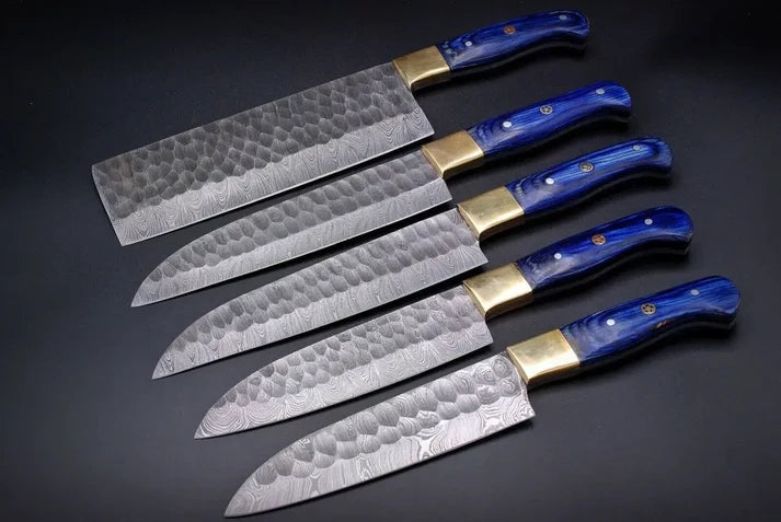 Damascus kitchen knife set of five with blue pakkawood handles and brass bolsters