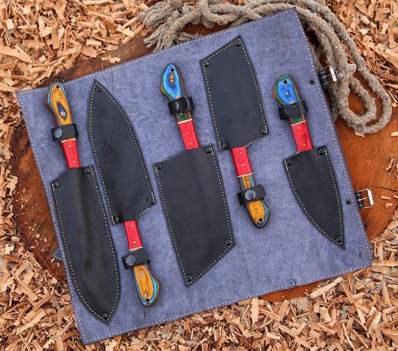 Damascus chef knife set in open leather roll with individual sheaths