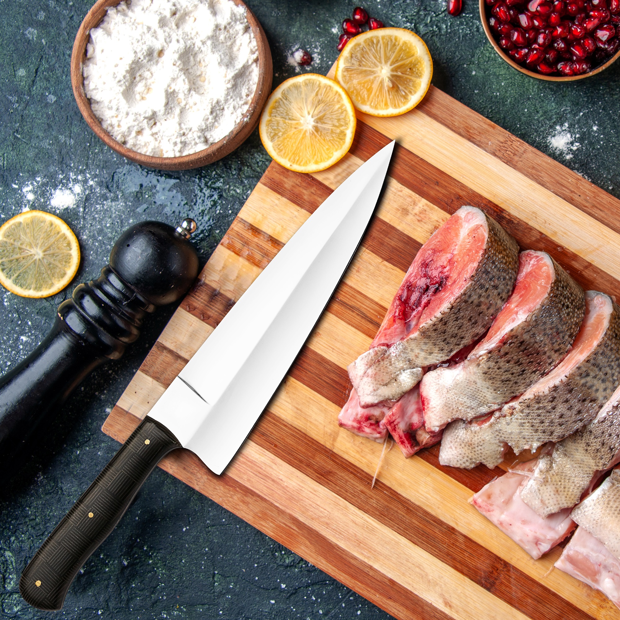 top view raw fish slices knife on cutting board vegetables on wo chef knives